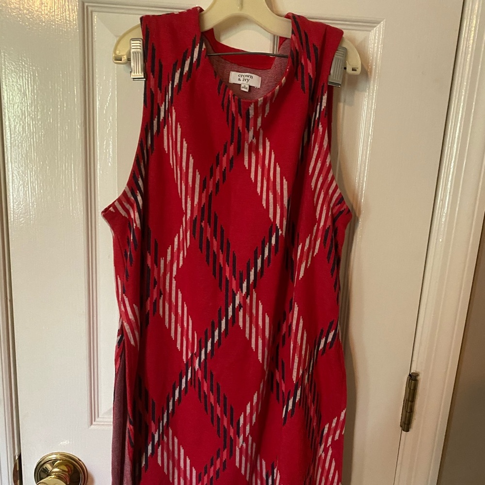 Long sleeveless sweater